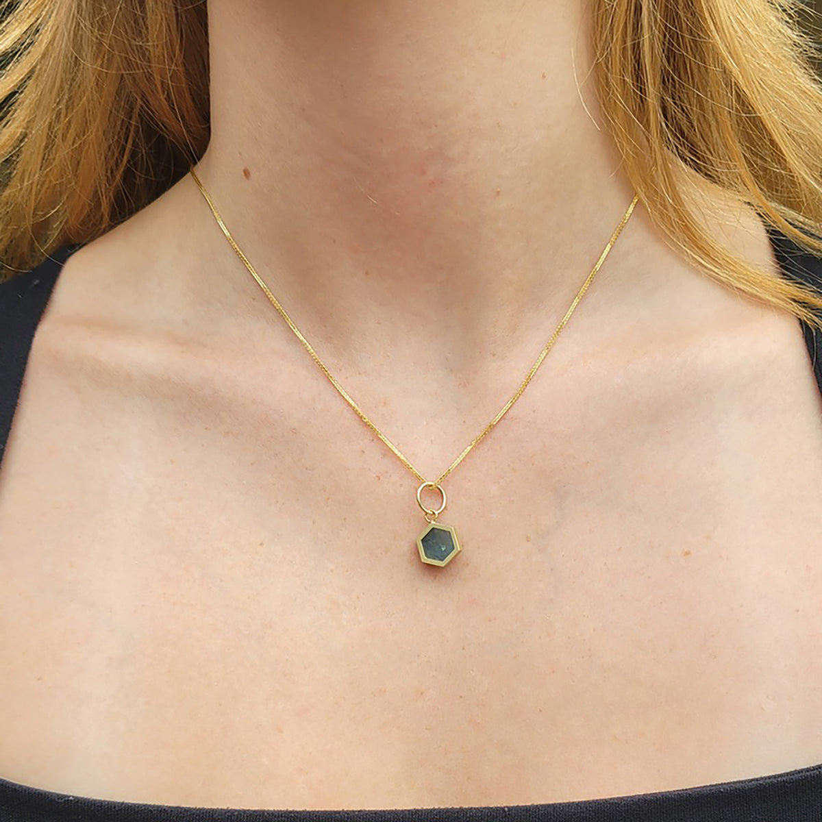 Hexagonal Aquamarine Slice Charm on Gold Chain on white female model | Rebecca Myers Collection