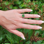 Asscher Cut Green Tourmaline Gemstone Ring on white female model | Rebecca Myers Design
