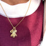 1.9mm 14k Yellow Gold Rolo Chain on female model in red sweater | Rebecca Myers Collection