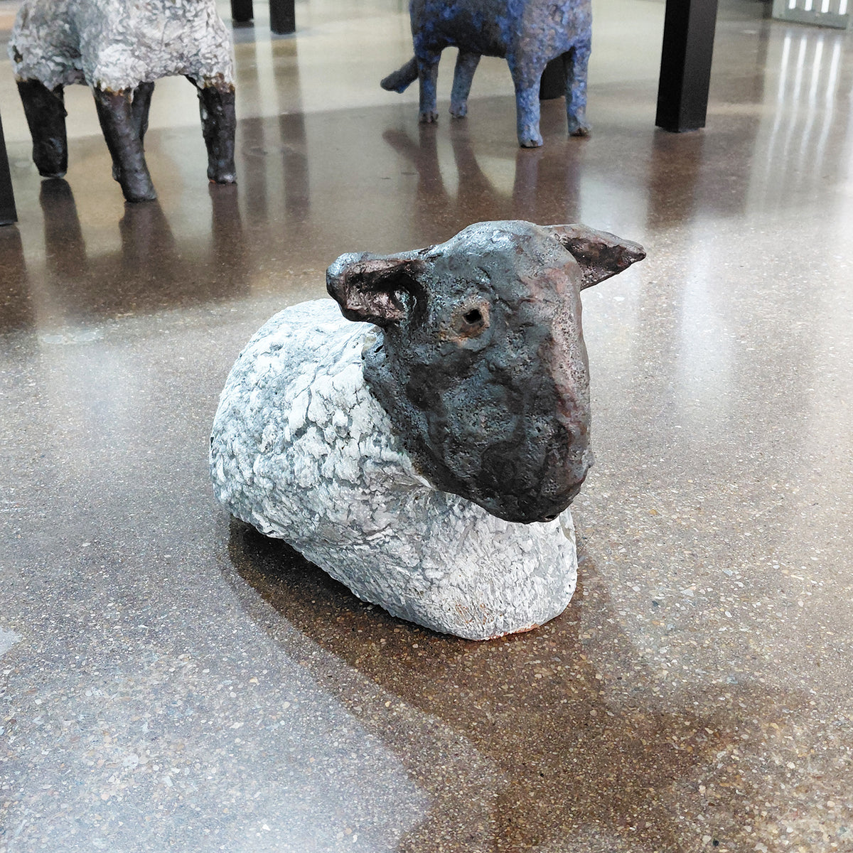 Ceramic Sitting Sheep Sculpture by Mark Chatterley, front view | Rebecca Myers Collection