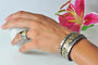 Animal Print Bracelets on white female model with lily | Rebecca Myers Collection