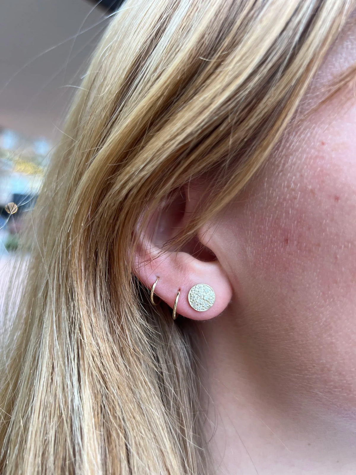 Small Gold Pave Disc Earrings on white female model with blonde hair | Rebecca Myers Collection