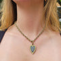 Large Framed Pave Diamond Heart on Handmade 14k Yellow Gold Chain on white female model | Rebecca Myers Collection