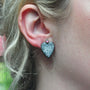 Large Pave Diamond Heart Earrings with Ruby Tops on white female model | Rebecca Myers Collection
