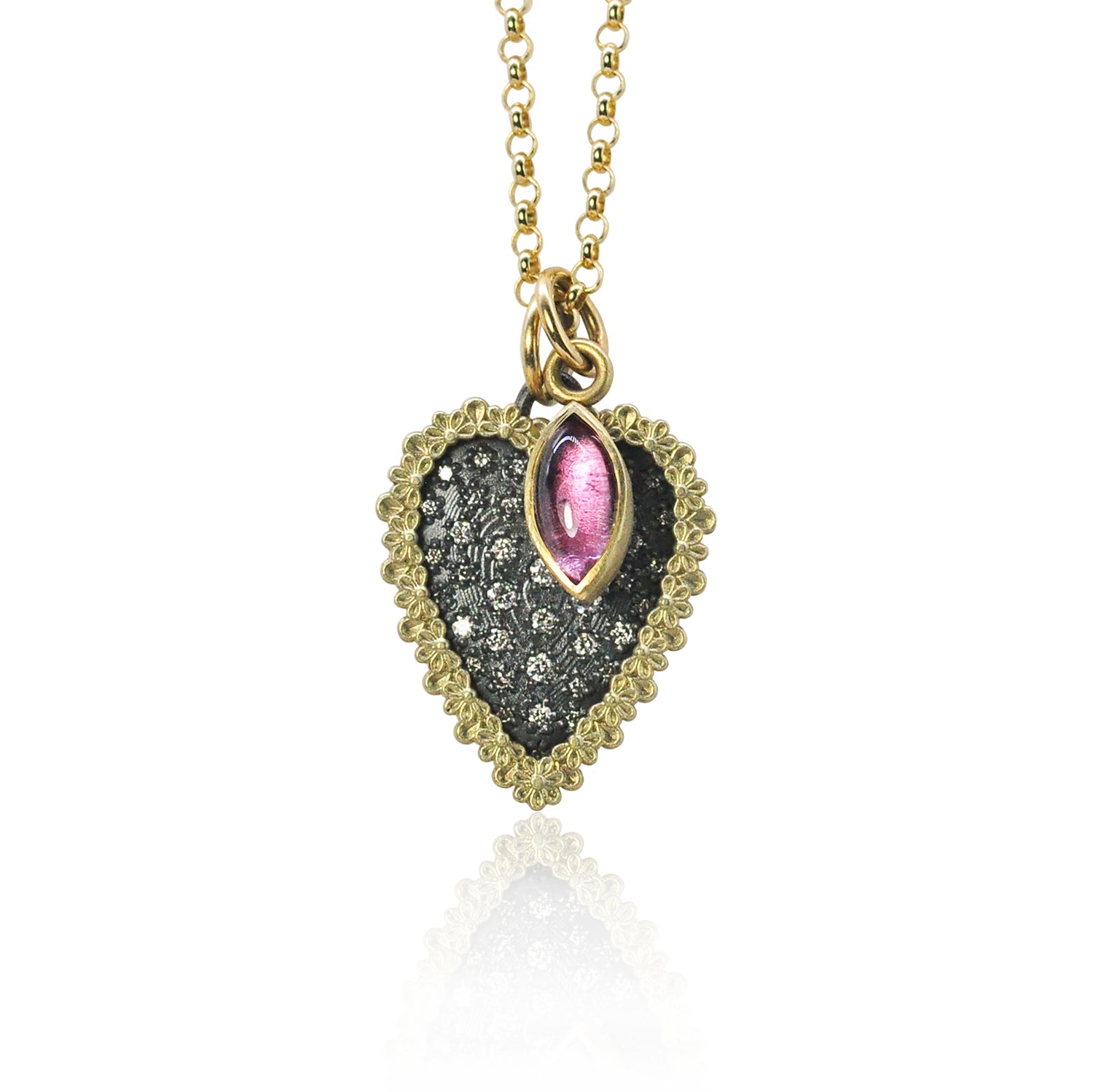Heart-shaped pendant with pink tourmaline and gold chain on white background | Rebecca Myers Collection