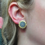 Medium Pave Diamond Sunflower Post Earrings on white female model | Rebecca Myers Collection