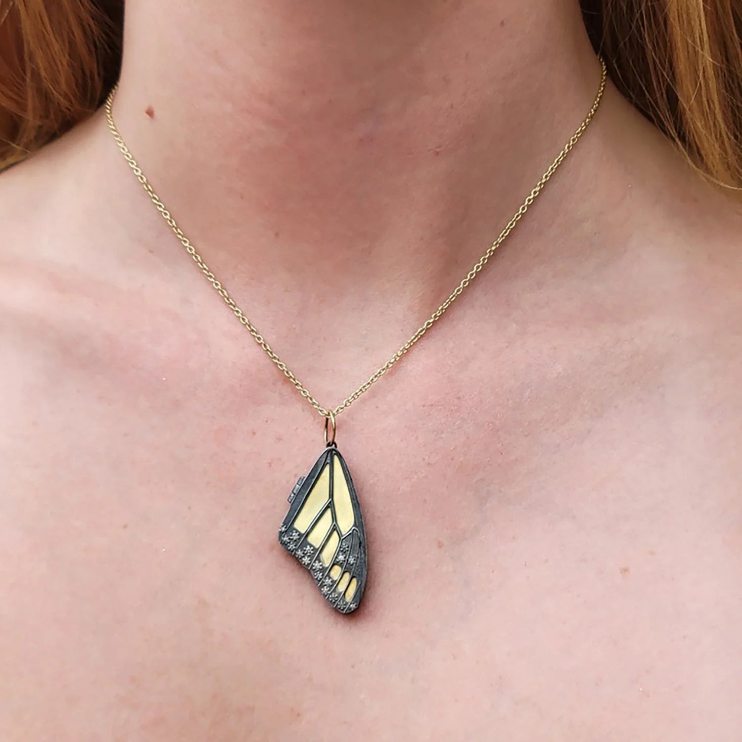 Gold & Silver Monarch Butterfly  Wing Locket with Scattered Diamonds on white female model | Rebecca Myers Collection