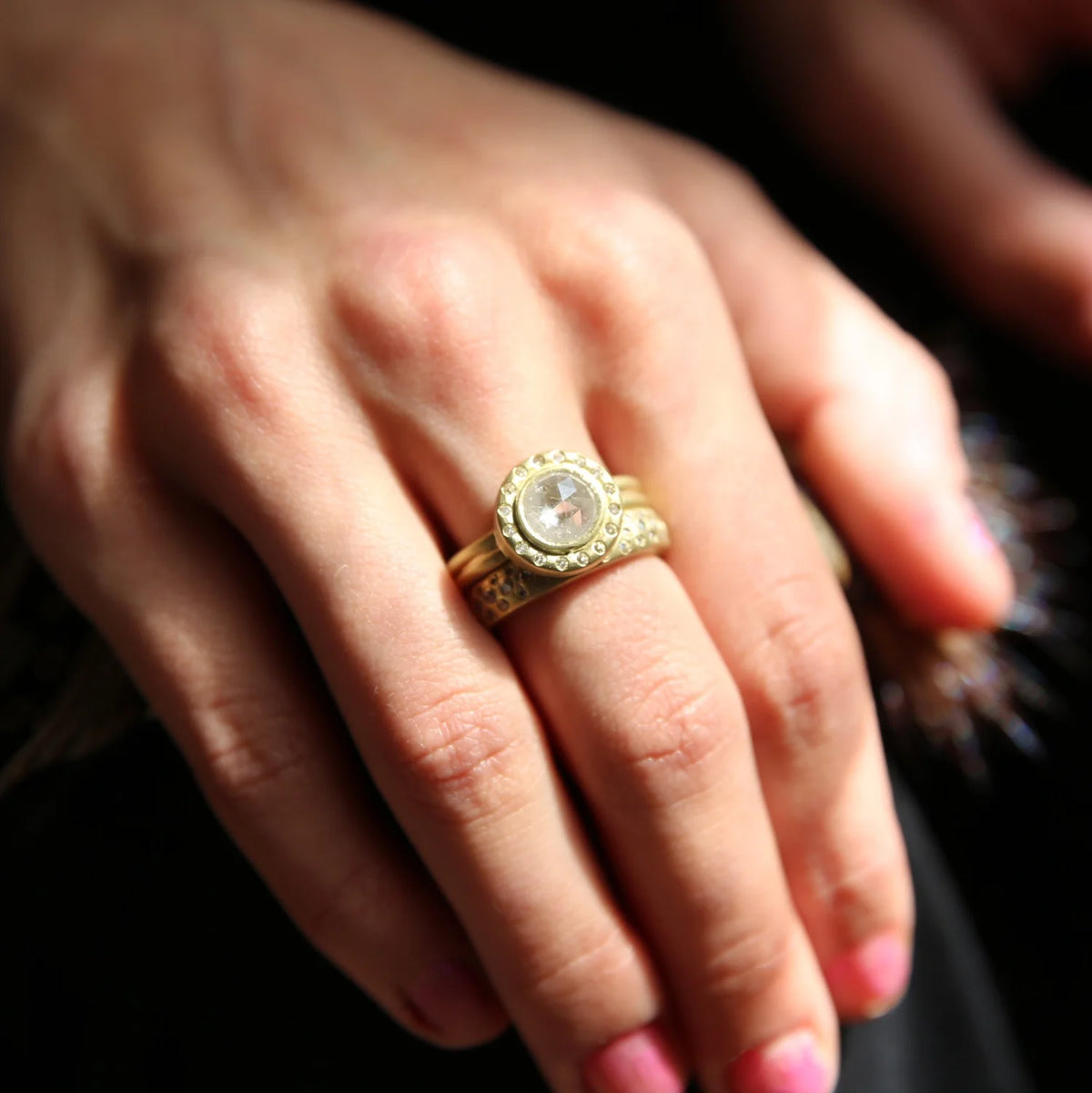 Natural Diamond Halo Ring on white female model | Rebecca Myers Collection