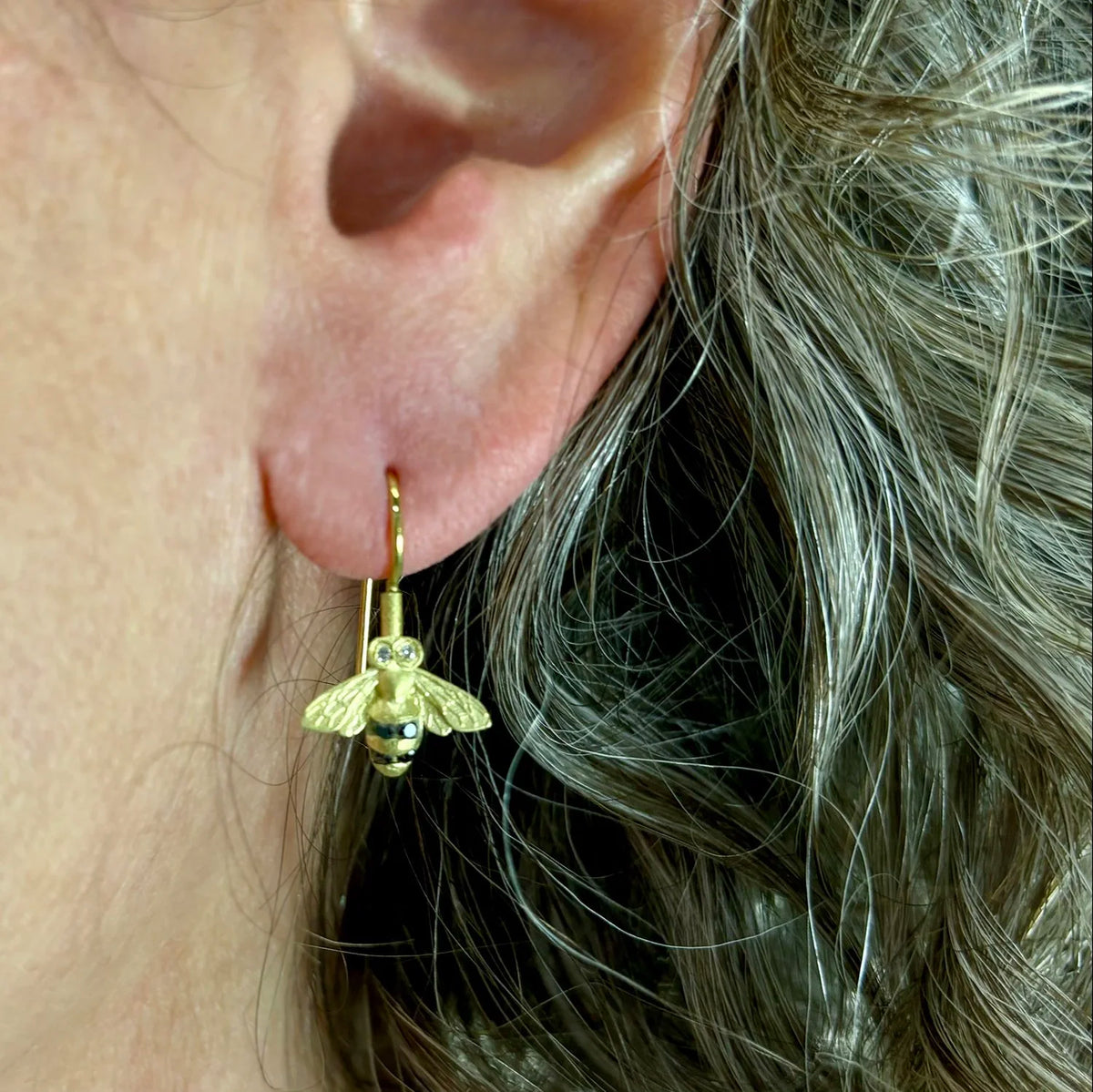 Small Honey Bee Earrings on white female model | Rebecca Myers Collection
