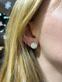 Large Gold Pave Disc Earrings on white female model | Rebecca Myers Collection