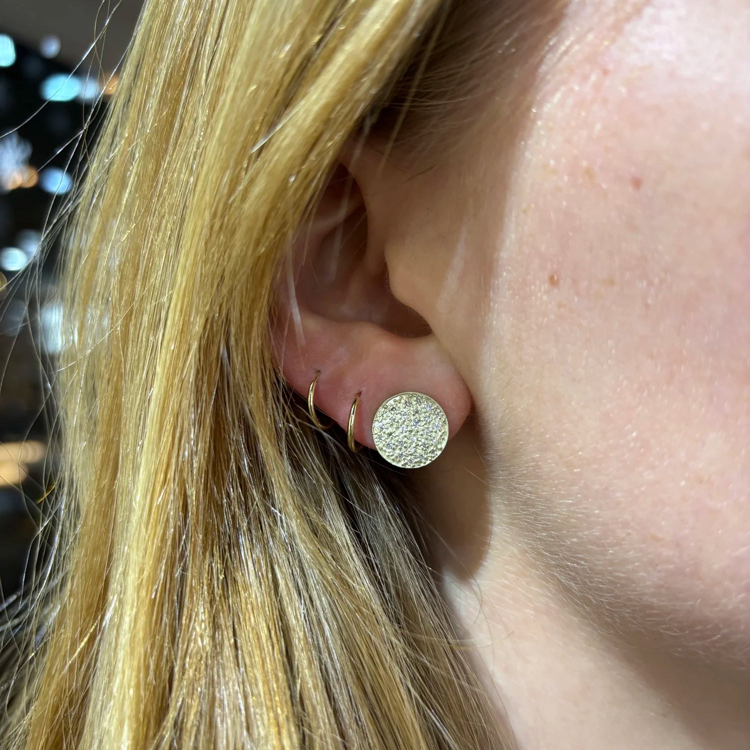 Large Gold Pave Disc Earrings on white female model | Rebecca Myers Collection