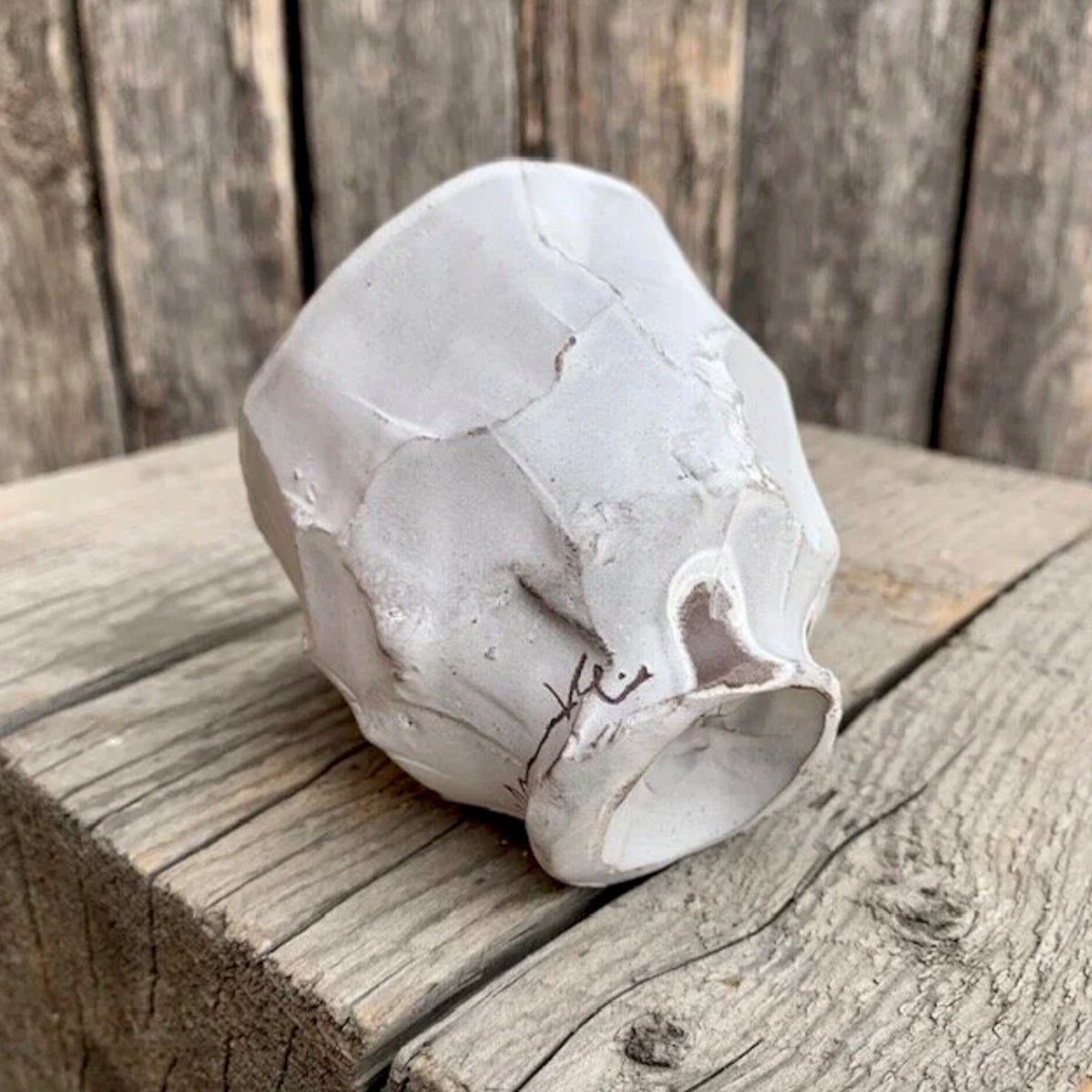 Logan Wannamaker White Ceramic Pine Cone Cup on rustic background view of bottom | Rebecca Myers Collection