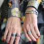Animal Print Diamond Channel Rings on white female model | Rebecca Myers Collection