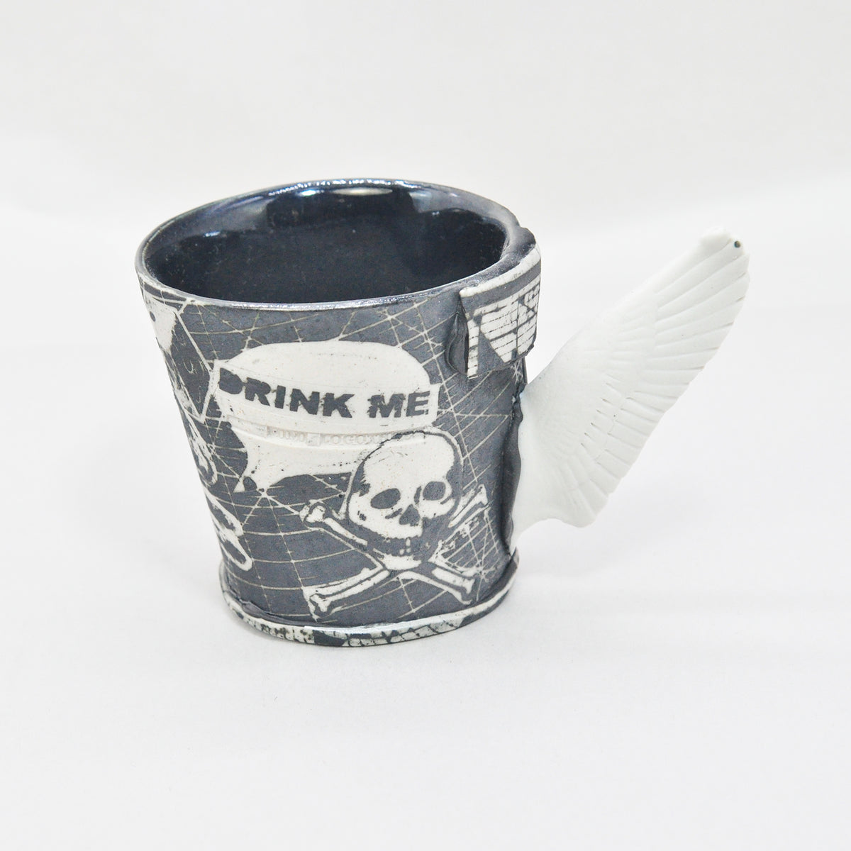 Black & White Winged Drink Me Cup by Mimi Logothetis, front view | Rebecca Myers Collection
