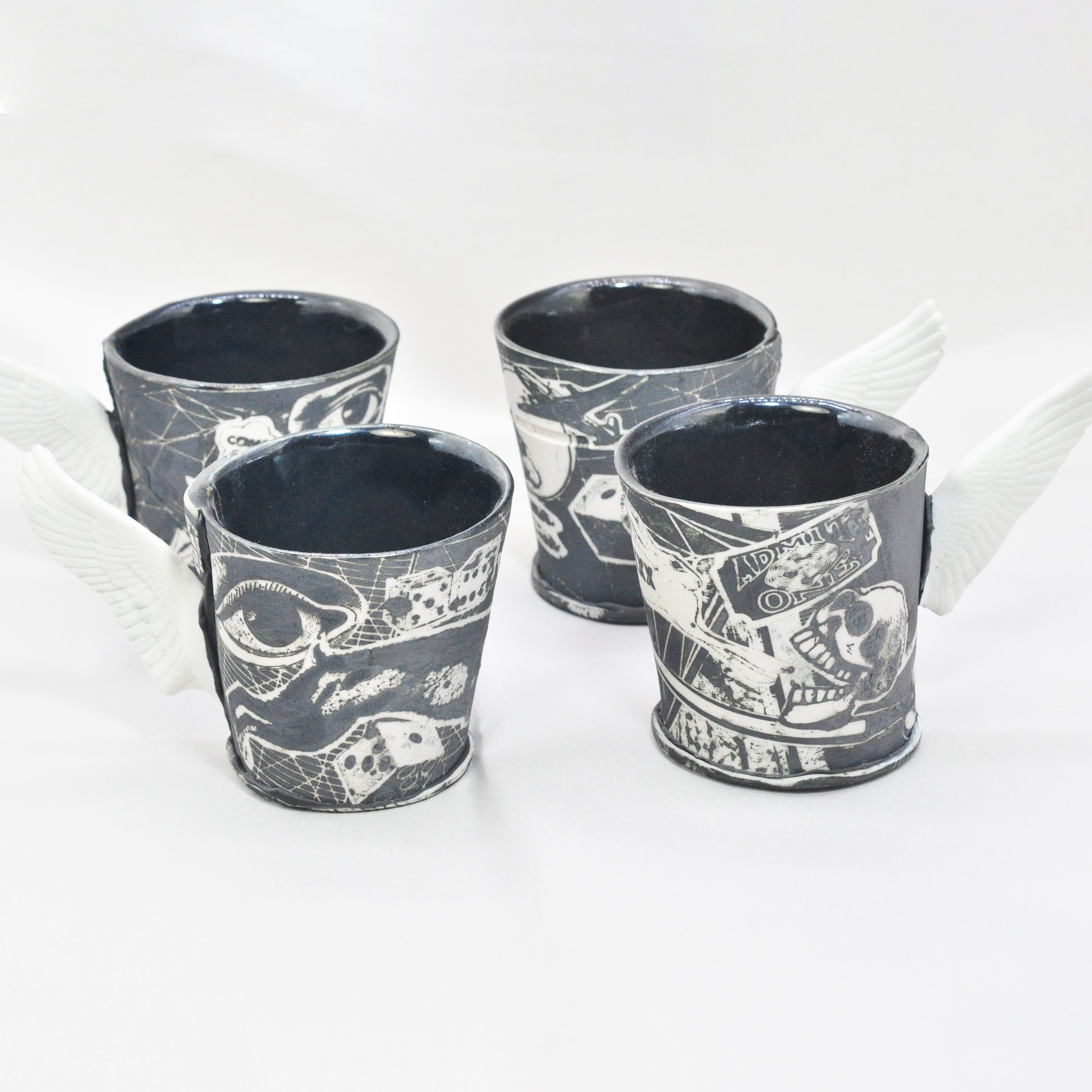 Black & White Winged Cups by Mimi Logothetis, set of four back view | Rebecca Myers Collection