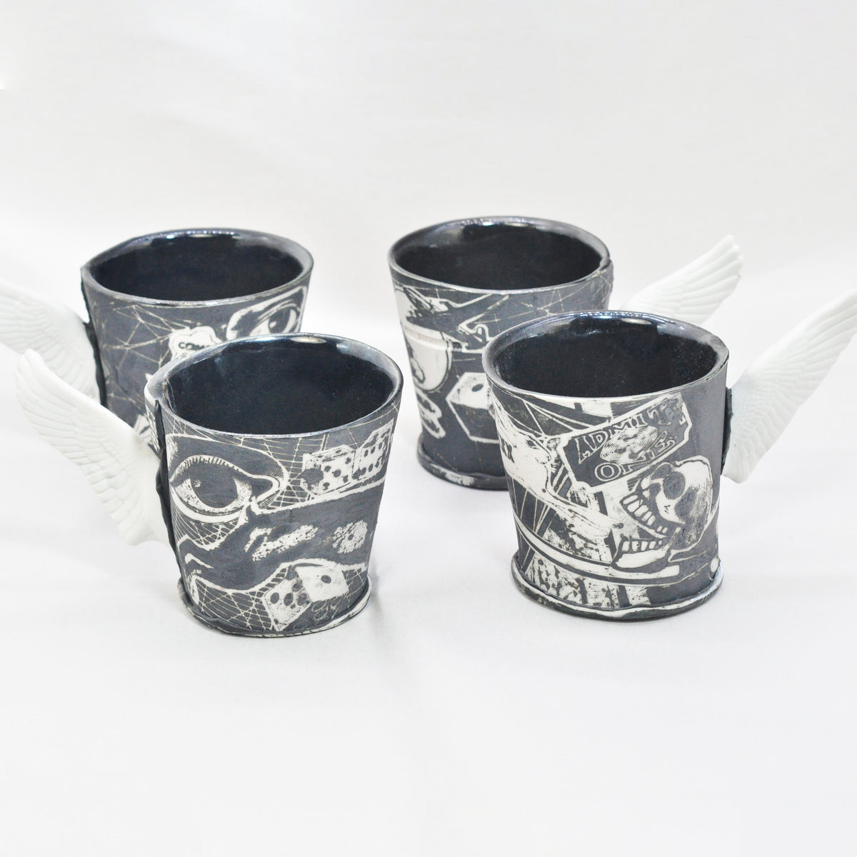 Black & White Winged Cups by Mimi Logothetis, set of four back view | Rebecca Myers Collection