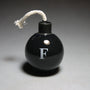 Small ceramic sculpture of F-Bomb by Michael Schwegmann | Rebecca Myers Collection