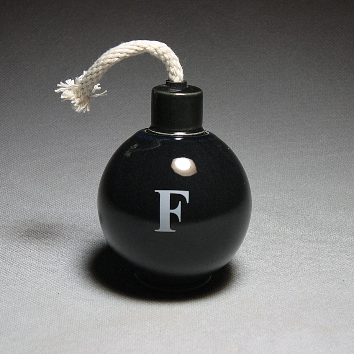 Small ceramic sculpture of F-Bomb by Michael Schwegmann | Rebecca Myers Collection