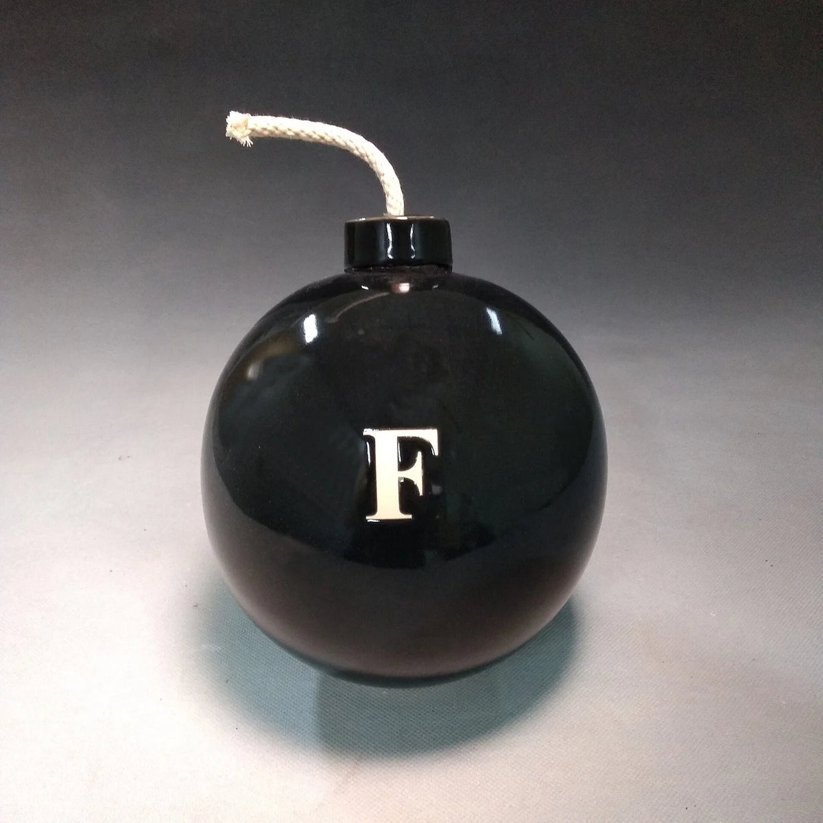 Large ceramic sculpture of F-Bomb by Michael Schwegmann | Rebecca Myers Collection